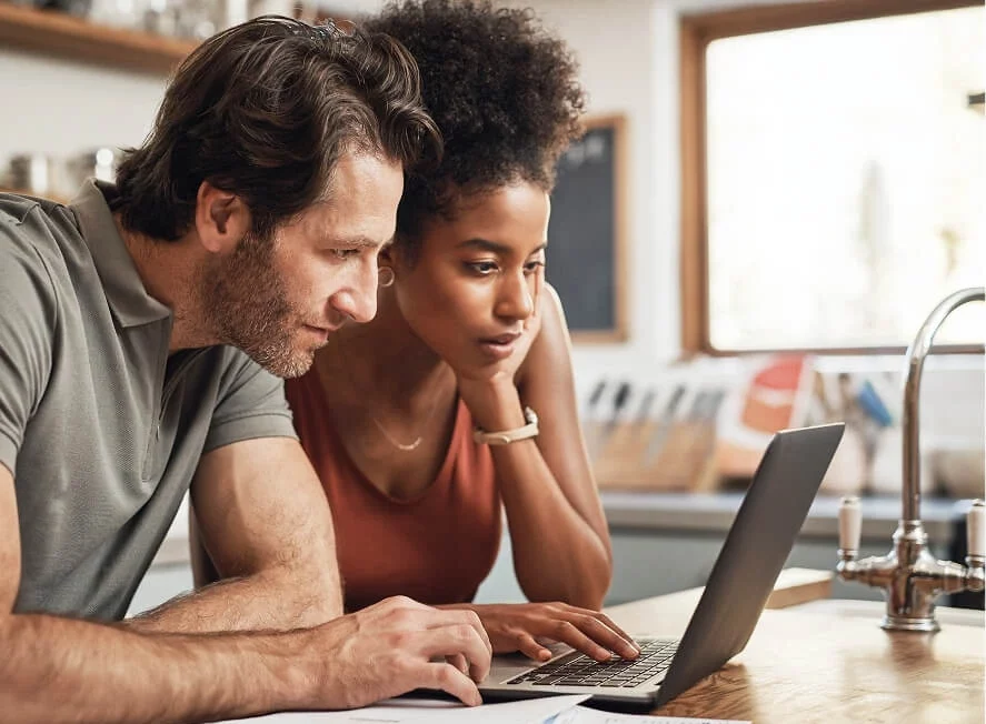 Couple looking at computer